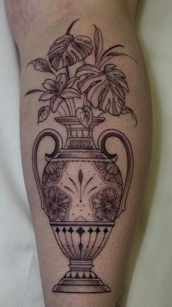 Blackwork floral vase tattoo by @ellsy_pulltattoos