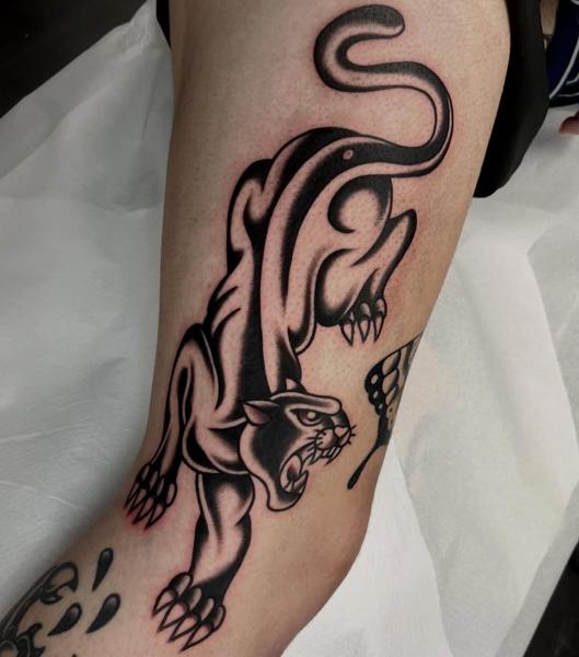 Traditional panther tattoo by @ellie_tattooer