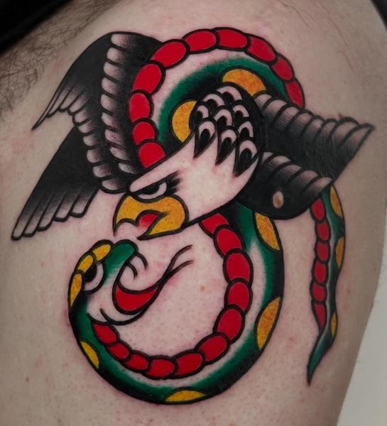 Traditional eagle and snake tattoo by @ellie_tattooer