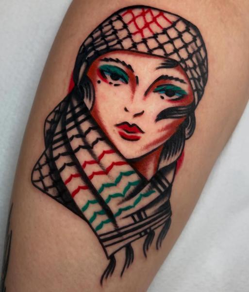 Traditional traditional woman tattoo by @ellie_tattooer