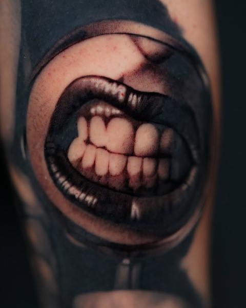 Black and grey realism grinning mouth tattoo by @ellietaylor.tattoos