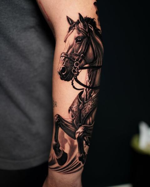 Realism armored horse tattoo by @ellietaylor.tattoos