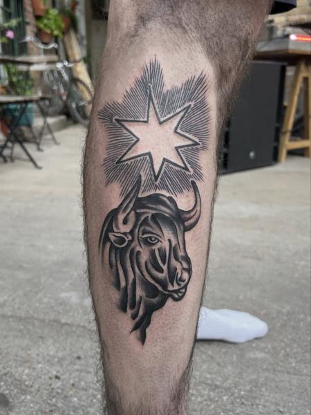 Blackwork bull and star tattoo by @elliottlane