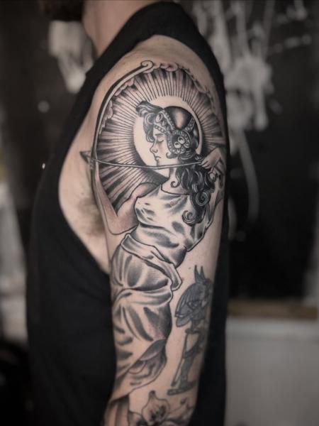 Blackwork goddess archer tattoo by @elliottlane