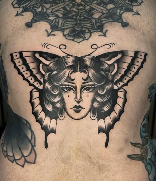 Traditional moth woman tattoo by @emmalouisetattoo