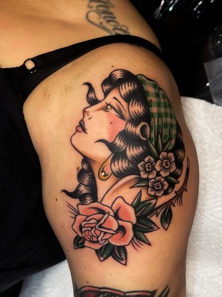 Traditional woman portrait tattoo by @emmalouisetattoo