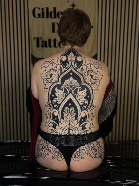 Blackwork ornamental floral tattoo by @emmalouisetattoo