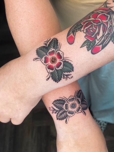 Traditional floral design tattoo by @emmalouisetattoo
