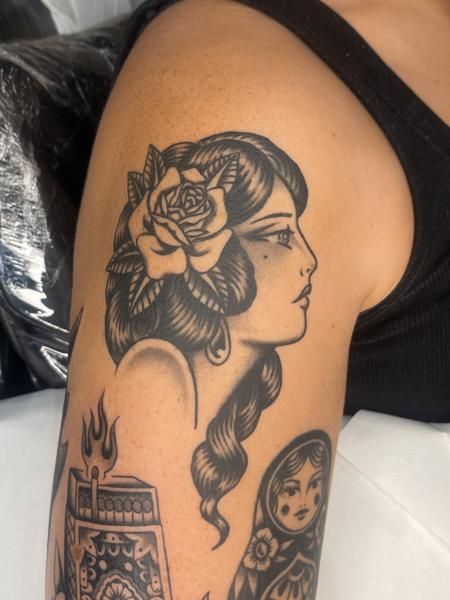 Traditional woman portrait tattoo by @emmalouisetattoo