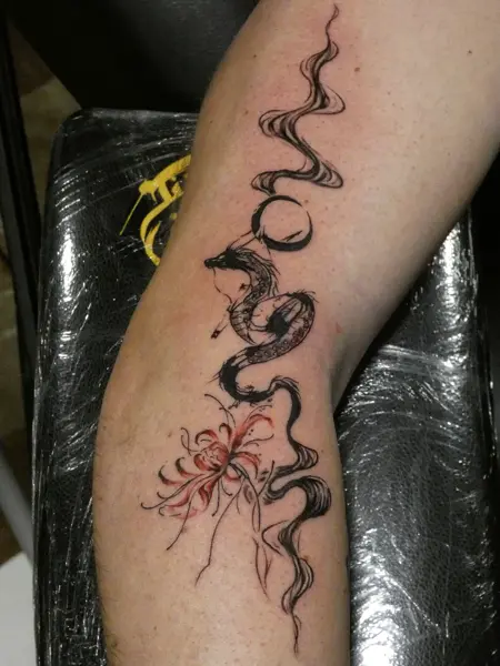 Fine line snake and flower tattoo by @endrilazaj