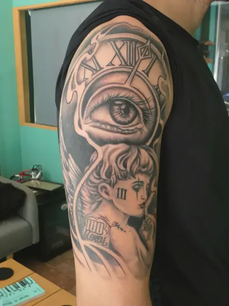 Realism eye and angel tattoo by @endrilazaj