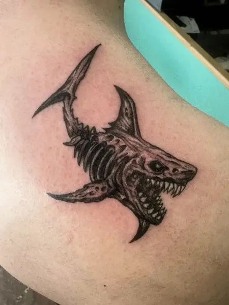 Blackwork skeletal shark tattoo by @endrilazaj