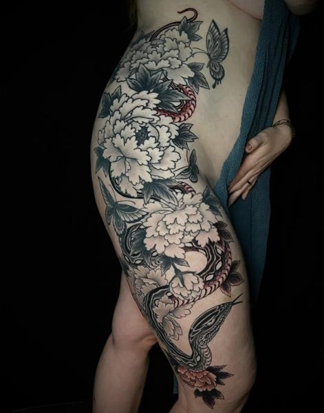 Japanese floral snake tattoo by @erik_van_cuyck