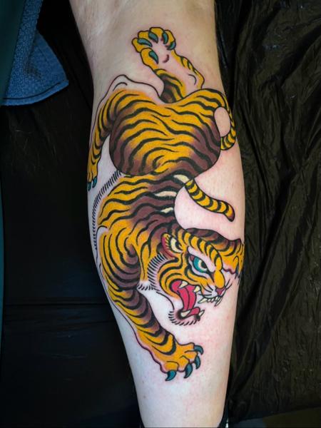 Traditional tiger tattoo by @erik_van_cuyck