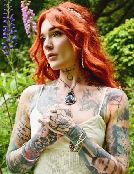 Color realism floral hand tattoo by @eireink
