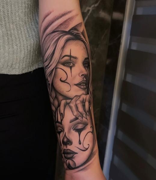 Realism dual faces tattoo by @erlindi_tattoo