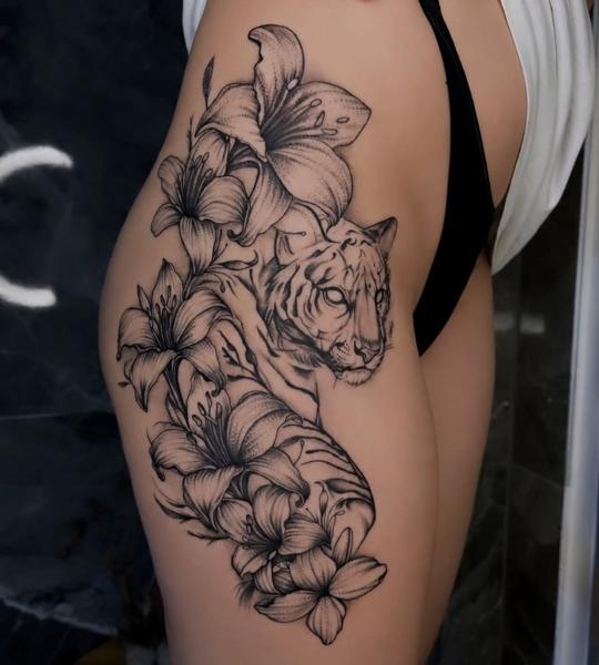 Blackwork tiger with lilies tattoo by @erlindi_tattoo