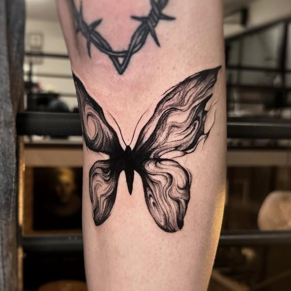 Blackwork abstract butterfly tattoo by @rotten_soull