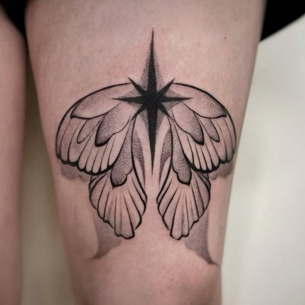 Blackwork moth and star tattoo by @rotten_soull