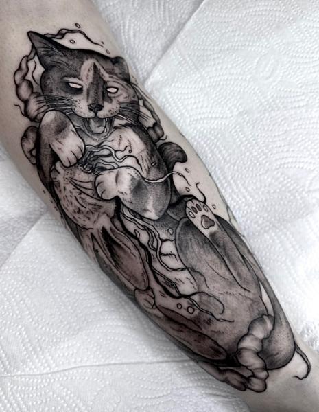 Blackwork abstract cat tattoo by @evxtattoo