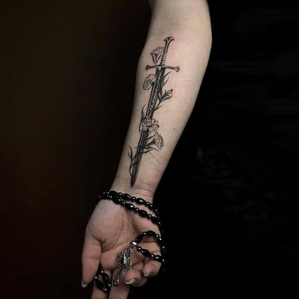 Fine line floral sword tattoo by @rotten_soull