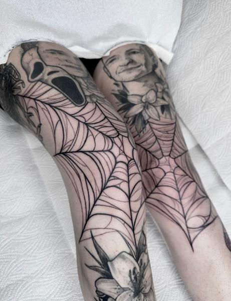 Blackwork spider web tattoo by @evxtattoo