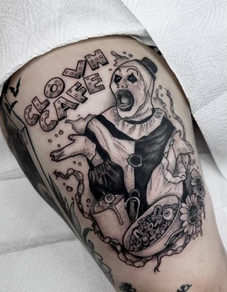 Blackwork creepy clown tattoo by @evxtattoo