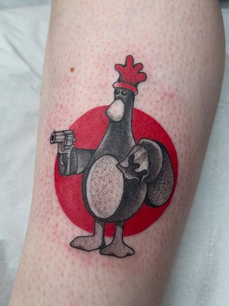 Illustrative penguin character tattoo by @elzavanhouden