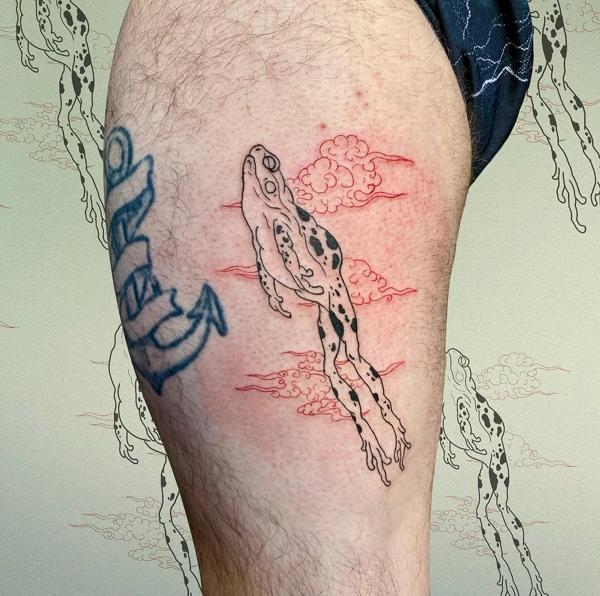 Fine line floating frog tattoo by @evi_ttt
