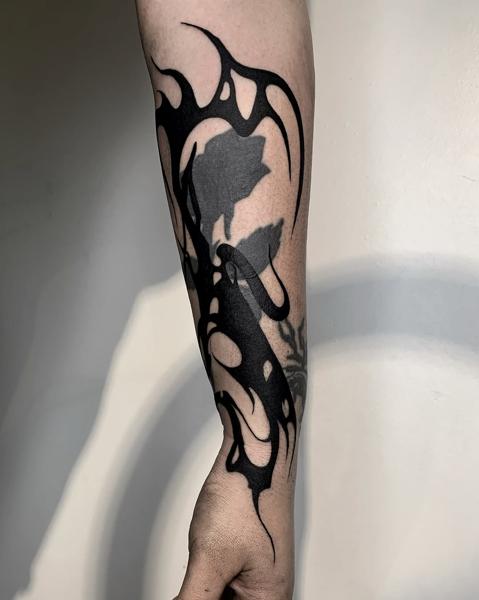 Blackwork abstract blackwork tattoo by @xema.tattoos