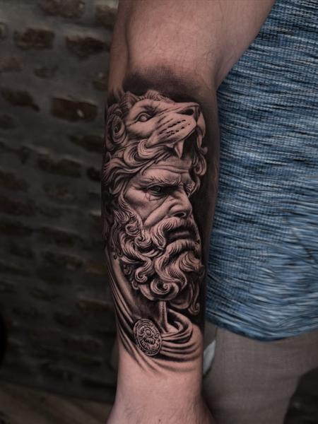 Realism lion head sculpture tattoo by @GiafkaTattoo33