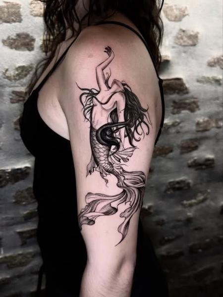 Fine line mermaid tattoo by @GiafkaTattoo33