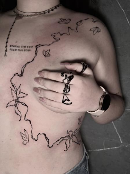 Fine line floral linework tattoo by @GiafkaTattoo33