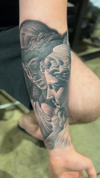 Realism sculpture faces tattoo by @fatboy_tattoos