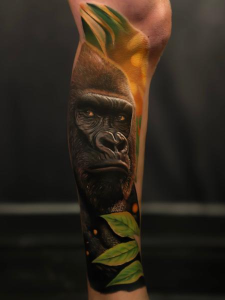 Realism gorilla portrait tattoo by @fayeskinnertattoo