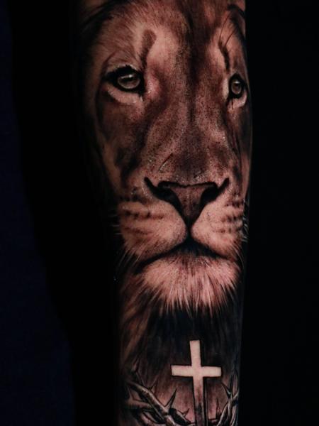 Realism lion and cross tattoo by @fer703
