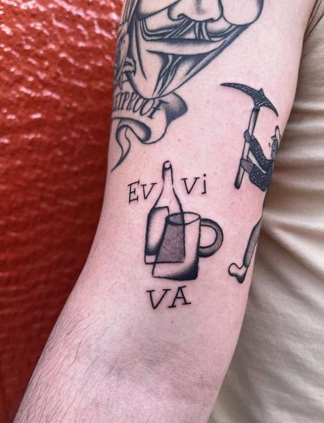 Traditional bottle mug tattoo by @billie_p_