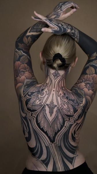 Ornamental ornamental backpiece tattoo by @filouino