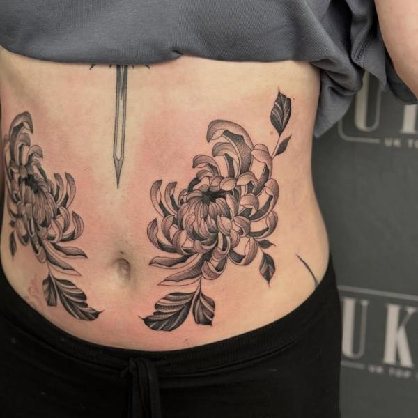Blackwork chrysanthemum flowers tattoo by @justbethtattoo