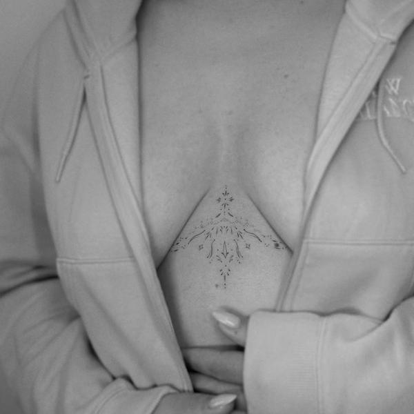 Fine line ornamental design tattoo by @eevee.tattoo