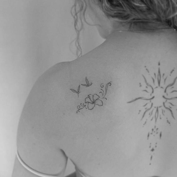 Fine line floral butterfly tattoo by @eevee.tattoo