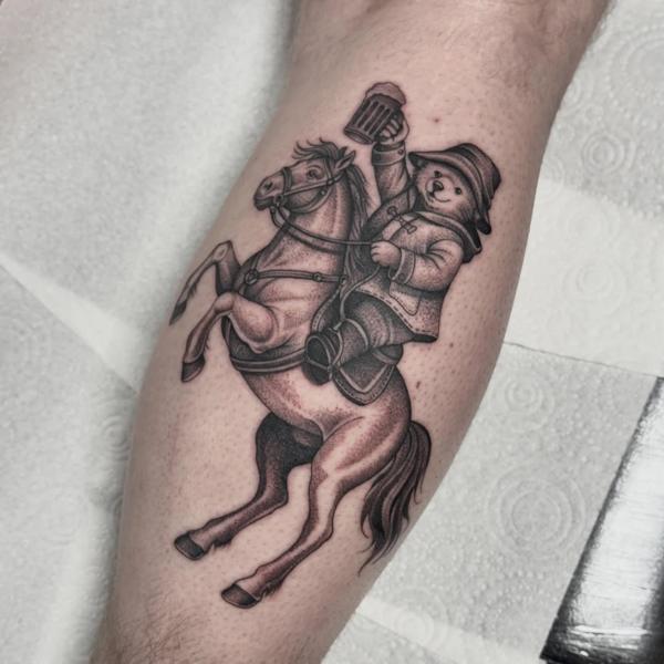 Illustrative bear on horse tattoo by @justbethtattoo