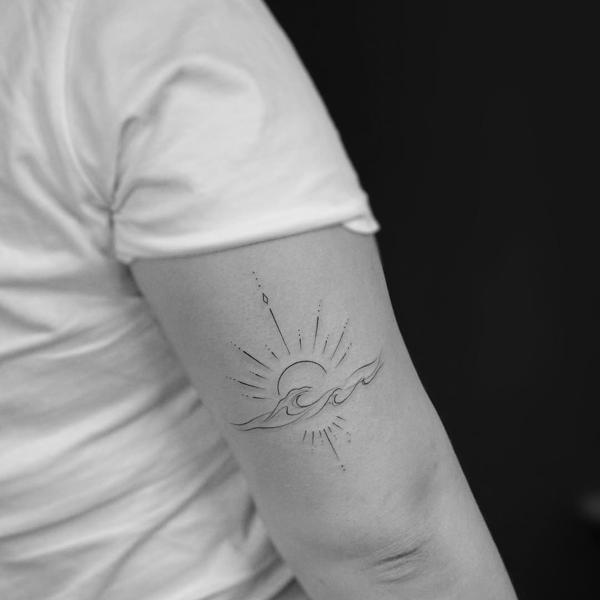 Fine line sun and wave tattoo by @eevee.tattoo