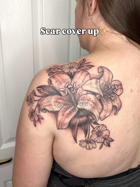 Realism floral lilies tattoo by @fiona_jay_tattoo