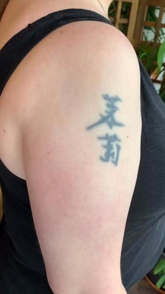 Blackwork chinese characters tattoo by @fiona_jay_tattoo