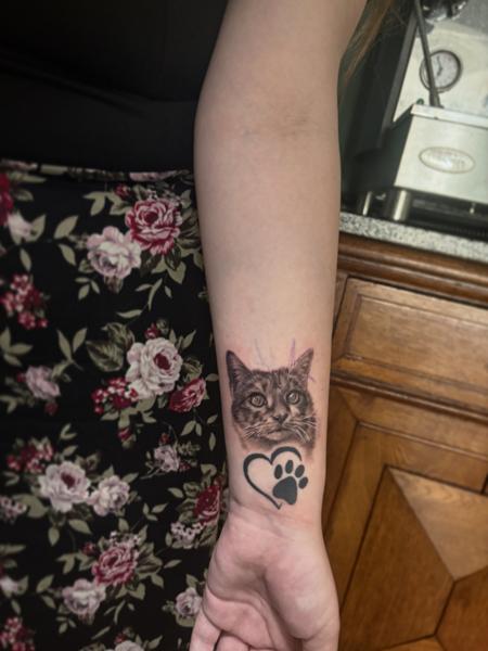 Realism cat portrait tattoo by @flozimmerertattoo