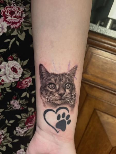 Realism cat portrait tattoo by @flozimmerertattoo