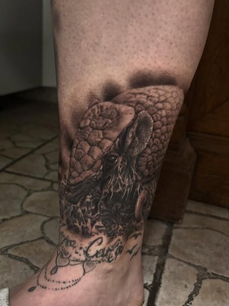 Realism armadillo tattoo by @flozimmerertattoo