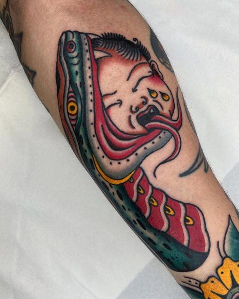 Traditional snake face tattoo by @fontascast