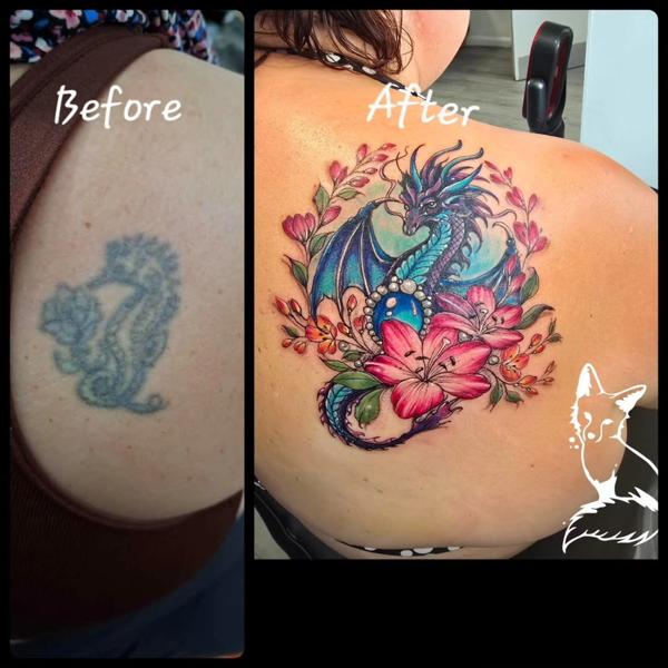 Color realism floral dragon tattoo by @foxytattooartist